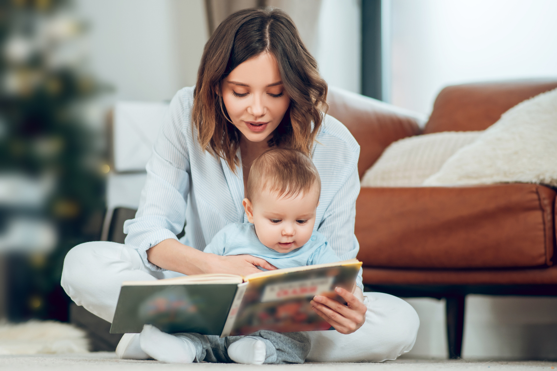 Mom Reading Book to Baby 